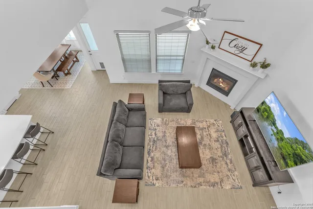 a kitchen with kitchen island granite countertop a sink a center island stainless steel appliances and cabinets