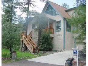 835 Cherokee Road Prescott, AZ 86303 - Photo 1 of 1 a front view of a house with a yard
