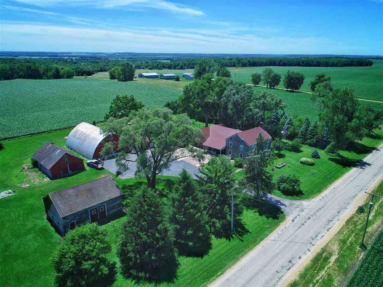 4365 East Brick Road Oregon, IL 61061 - Photo 24 of 25 a view of a house with a yard