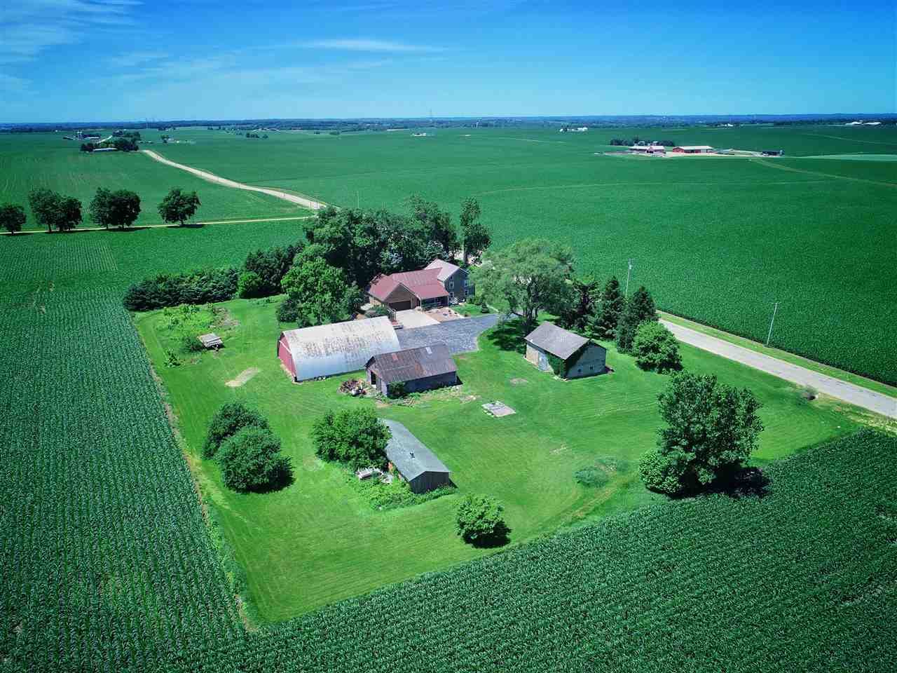 4365 East Brick Road Oregon, IL 61061 - Photo 25 of 25 a green field with lots of plants in it