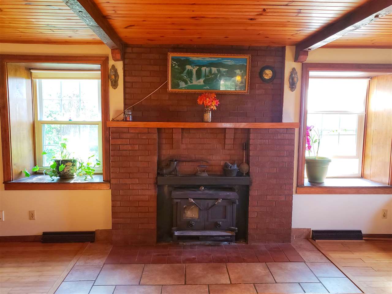 4365 East Brick Road Oregon, IL 61061 - Photo 4 of 25 a living room with furniture and a fireplace