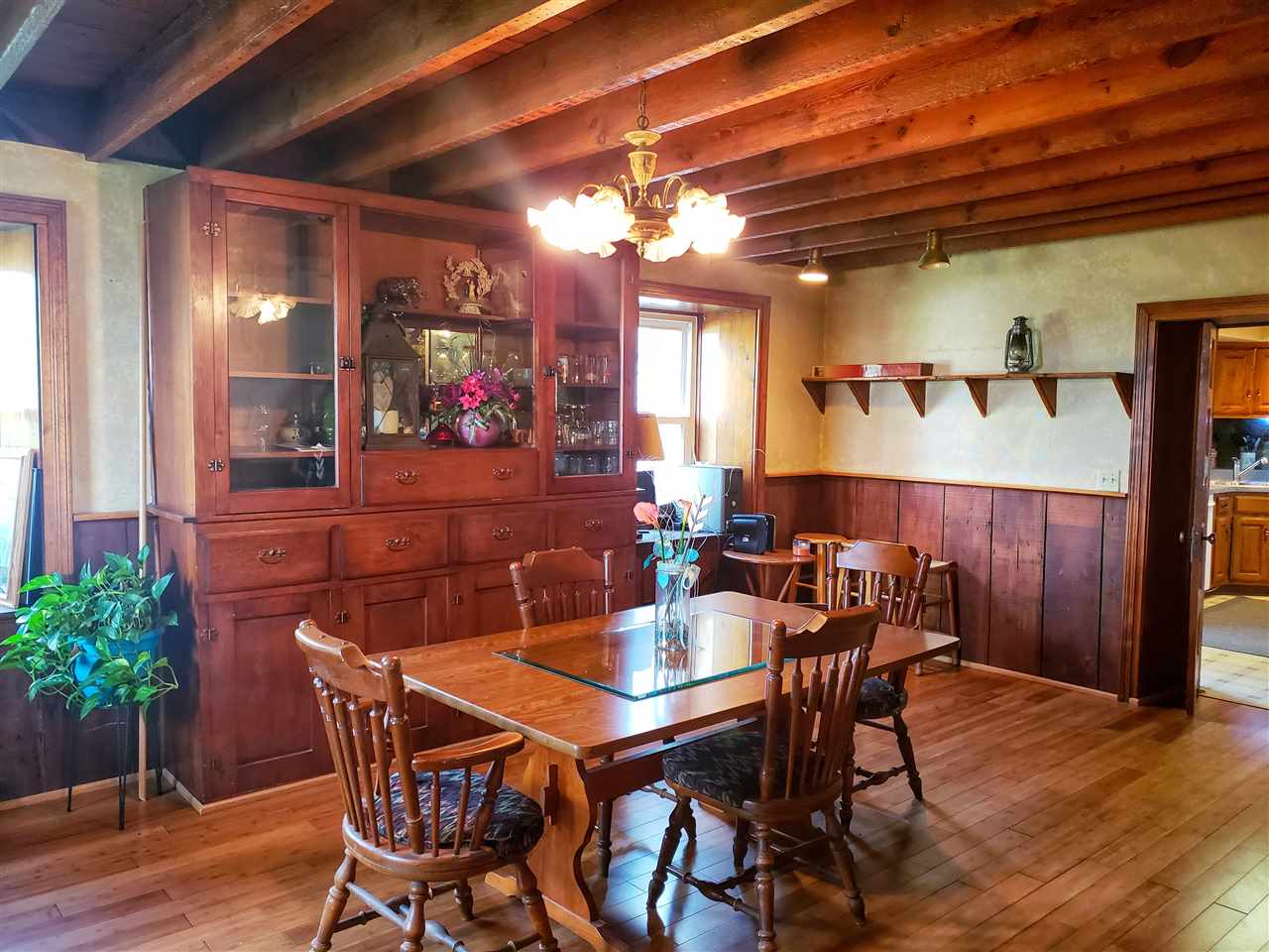 4365 East Brick Road Oregon, IL 61061 - Photo 5 of 25 a view of a dining room with furniture and wooden floor