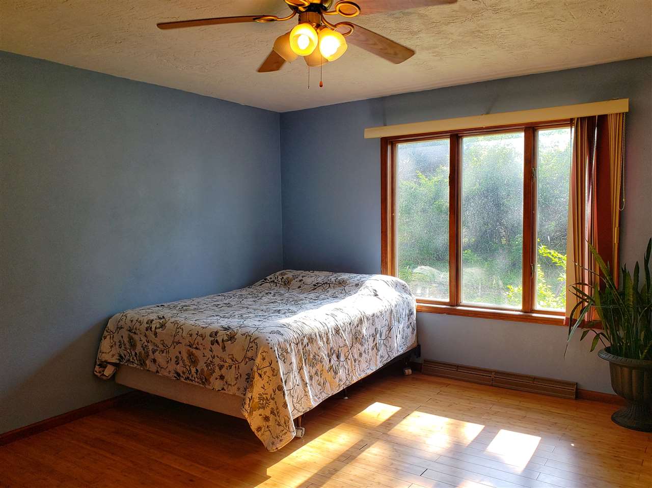 4365 East Brick Road Oregon, IL 61061 - Photo 10 of 25 a bedroom with a bed and a window