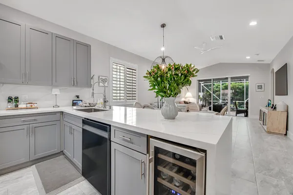 a kitchen with a sink and cabinets