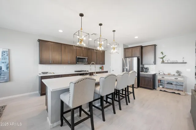 a view of a dining room kitchen and a window