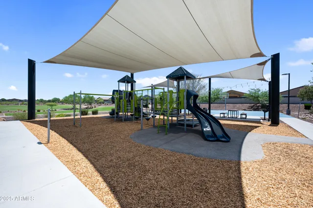 an aerial view of a house with a ocean view