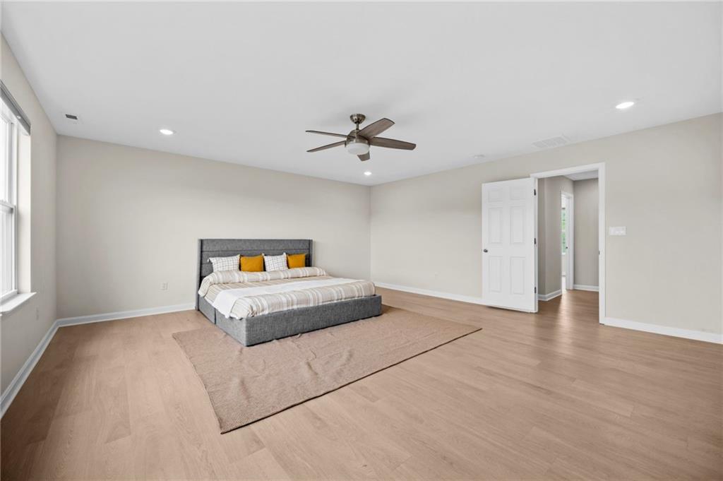 269 Lily Ridge Drive Canonsburg, PA 15317 - Photo 20 of 48 a bedroom with a bed and a ceiling fan