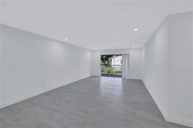 a view of a kitchen with a sink