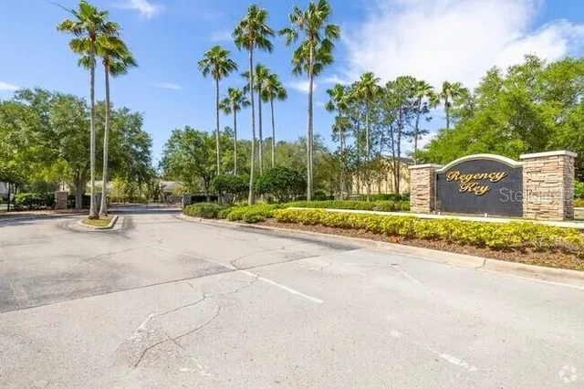 a park view with a sign board