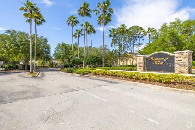 2246 Lake Woodberry Circle Brandon, FL 33510 - Photo 3 of 21 a park view with a sign board