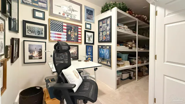 a bedroom with a bed and furniture