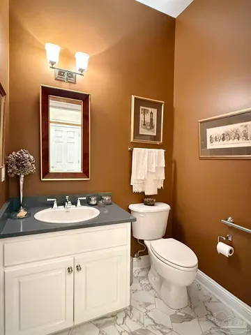 a en suite bathroom with double sink and a mirror