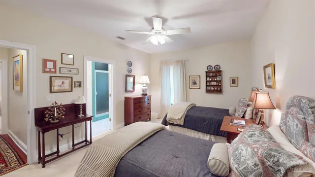 a view of a two chairs and table in the balcony