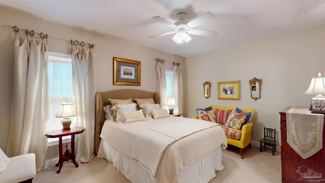 a view of a swimming pool with a patio and a garden
