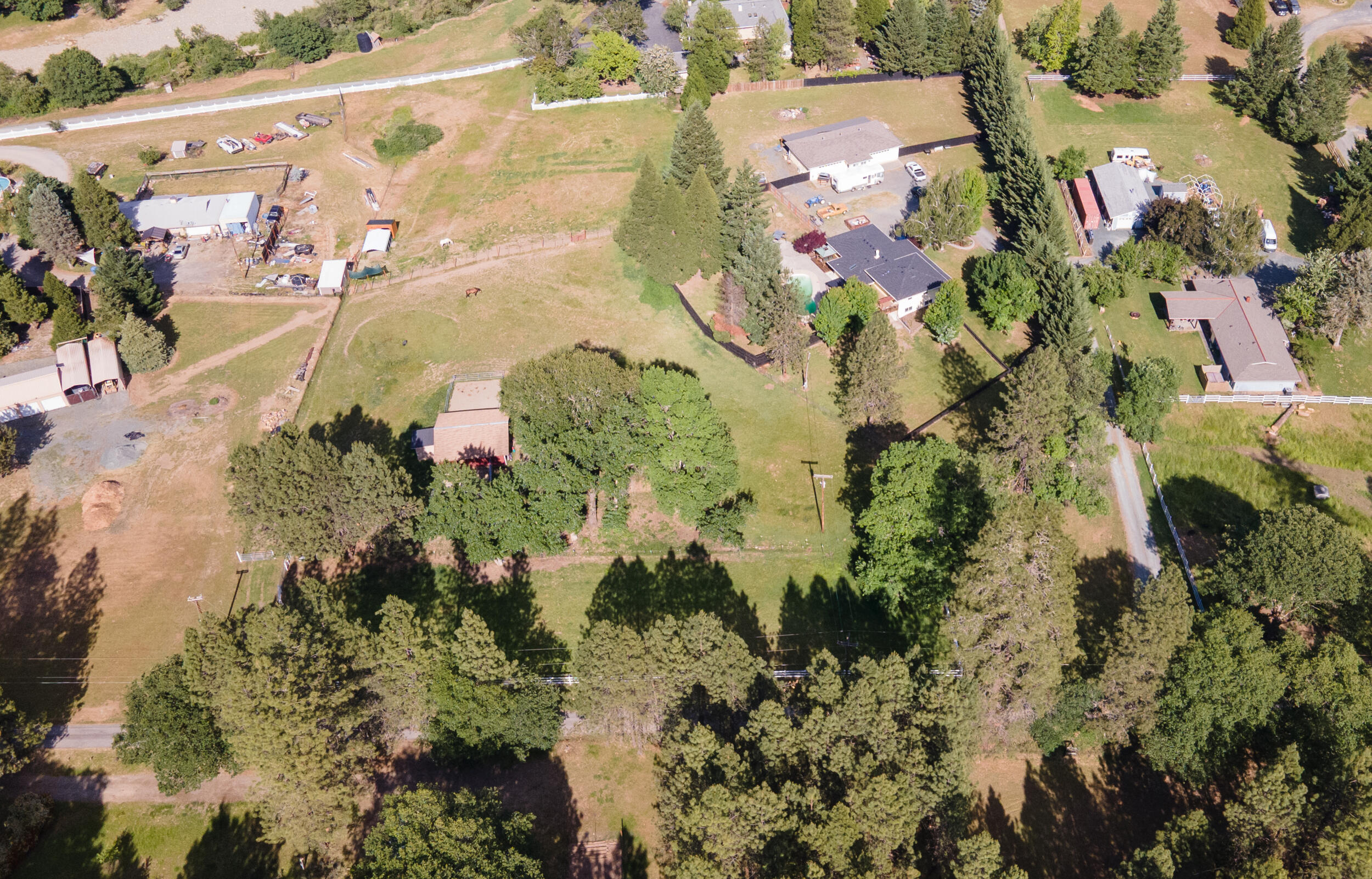 255 Queens Branch Road Rogue River, OR 97537 - Photo 58 of 60 an aerial view of residential houses with outdoor space