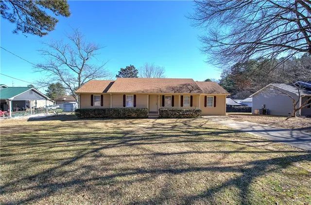 a front view of a house with swimming pool