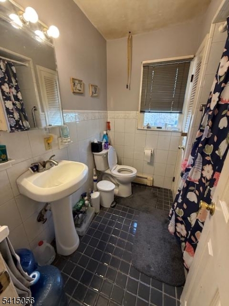 38 Highland Lakes Road Vernon, NJ 07462 - Photo 12 of 21 a bathroom with a sink toilet and mirror