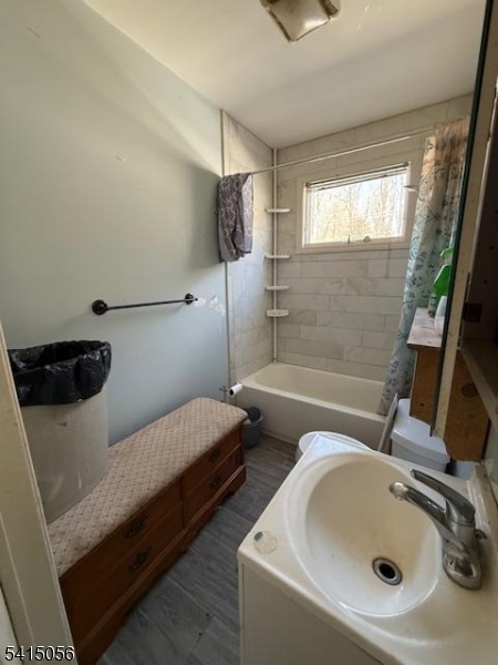 38 Highland Lakes Road Vernon, NJ 07462 - Photo 15 of 21 a bathroom with a sink and a tub