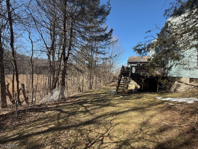 38 Highland Lakes Road Vernon, NJ 07462 - Photo 19 of 21 a view of a yard with a tree