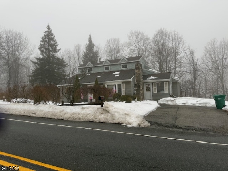 38 Highland Lakes Road Vernon, NJ 07462 - Photo 2 of 21 a view of a house with a yard