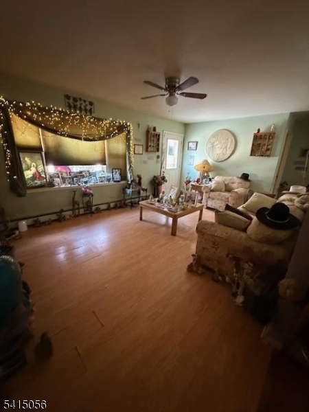 38 Highland Lakes Road Vernon, NJ 07462 - Photo 8 of 21 a living room with furniture and a flat screen tv