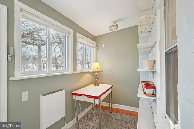 a room with furniture and window