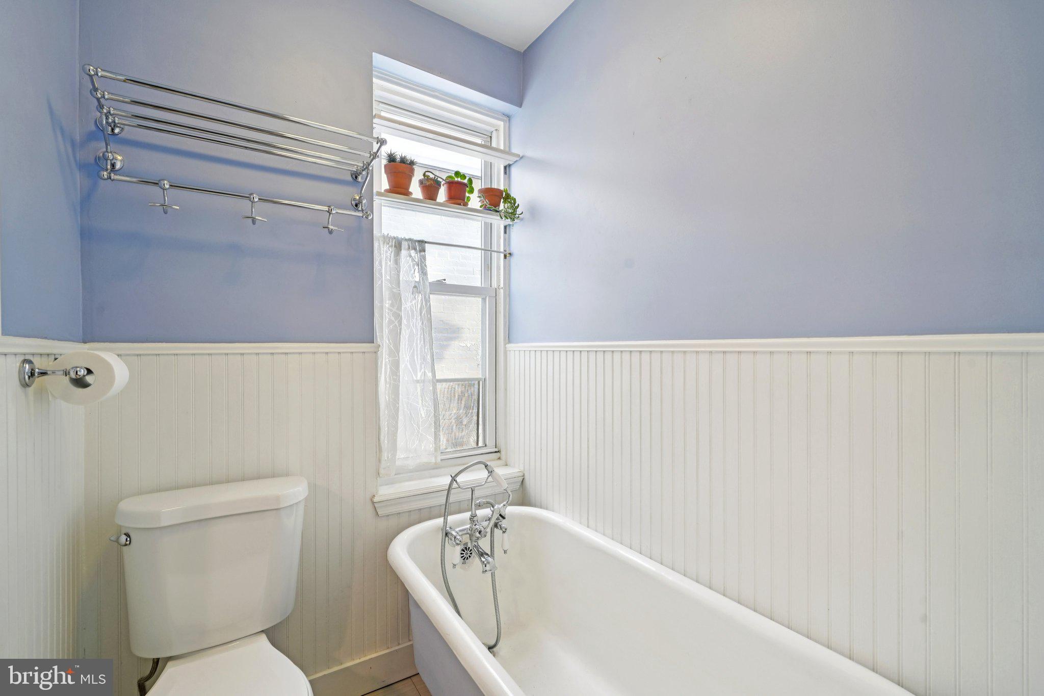 3008 Poplar Street Philadelphia, PA 19130 - Photo 32 of 50 a bathroom with a bathtub and a toilet