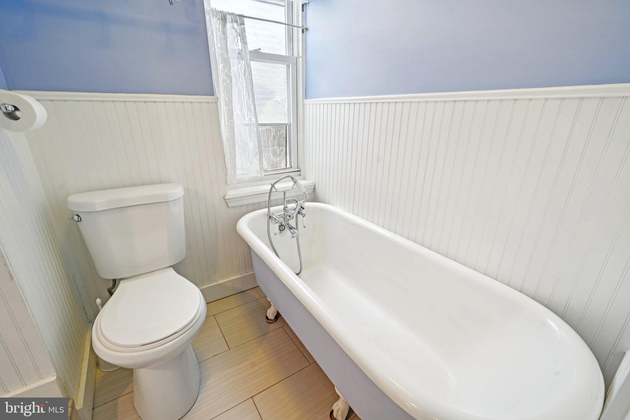 3008 Poplar Street Philadelphia, PA 19130 - Photo 33 of 50 a white toilet sitting next to a white sink