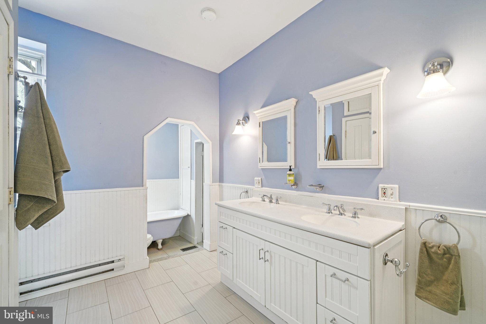 3008 Poplar Street Philadelphia, PA 19130 - Photo 35 of 50 a utility room with dryer and washer