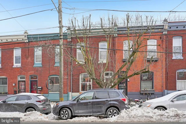 a cars parked in front of a building