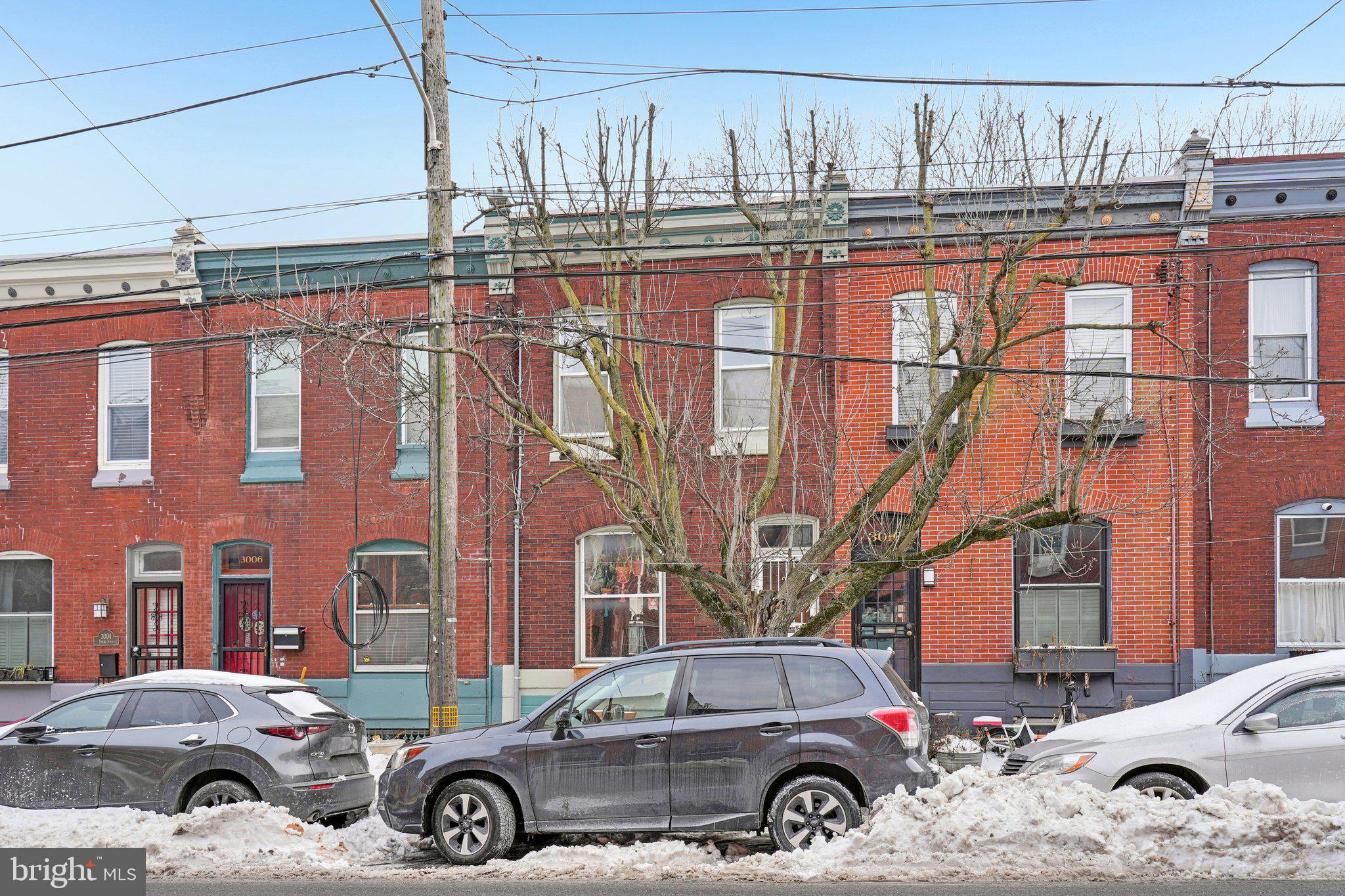 3008 Poplar Street Philadelphia, PA 19130 - Photo 48 of 50 a front view of a building with parking space