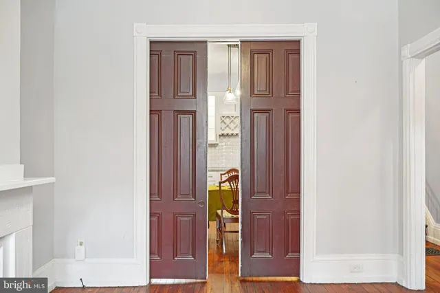 a view of hallway with mirror