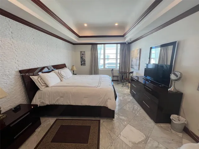 a room with gym equipment and a large window