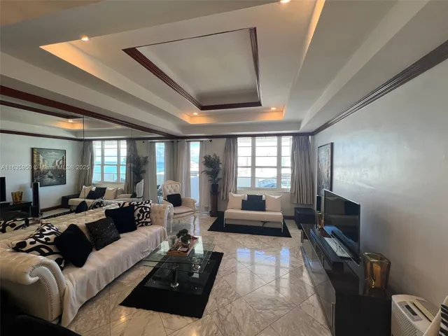 a kitchen with granite countertop a stove and a microwave