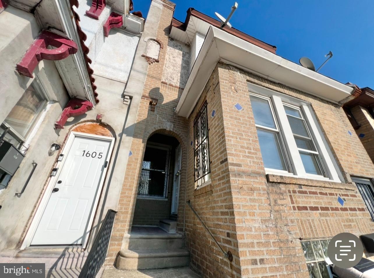 1607 South 60th Street, Unit 1 Philadelphia, PA 19142 - Photo 2 of 16 a view of entryway with a hallway