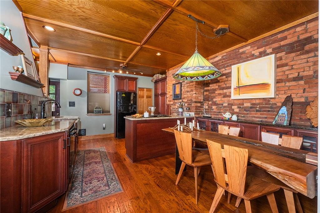 2220 Sarah Street, Unit 1 Pittsburgh, PA 15203 - Photo 5 of 37 a view of a chairs and table in a patio