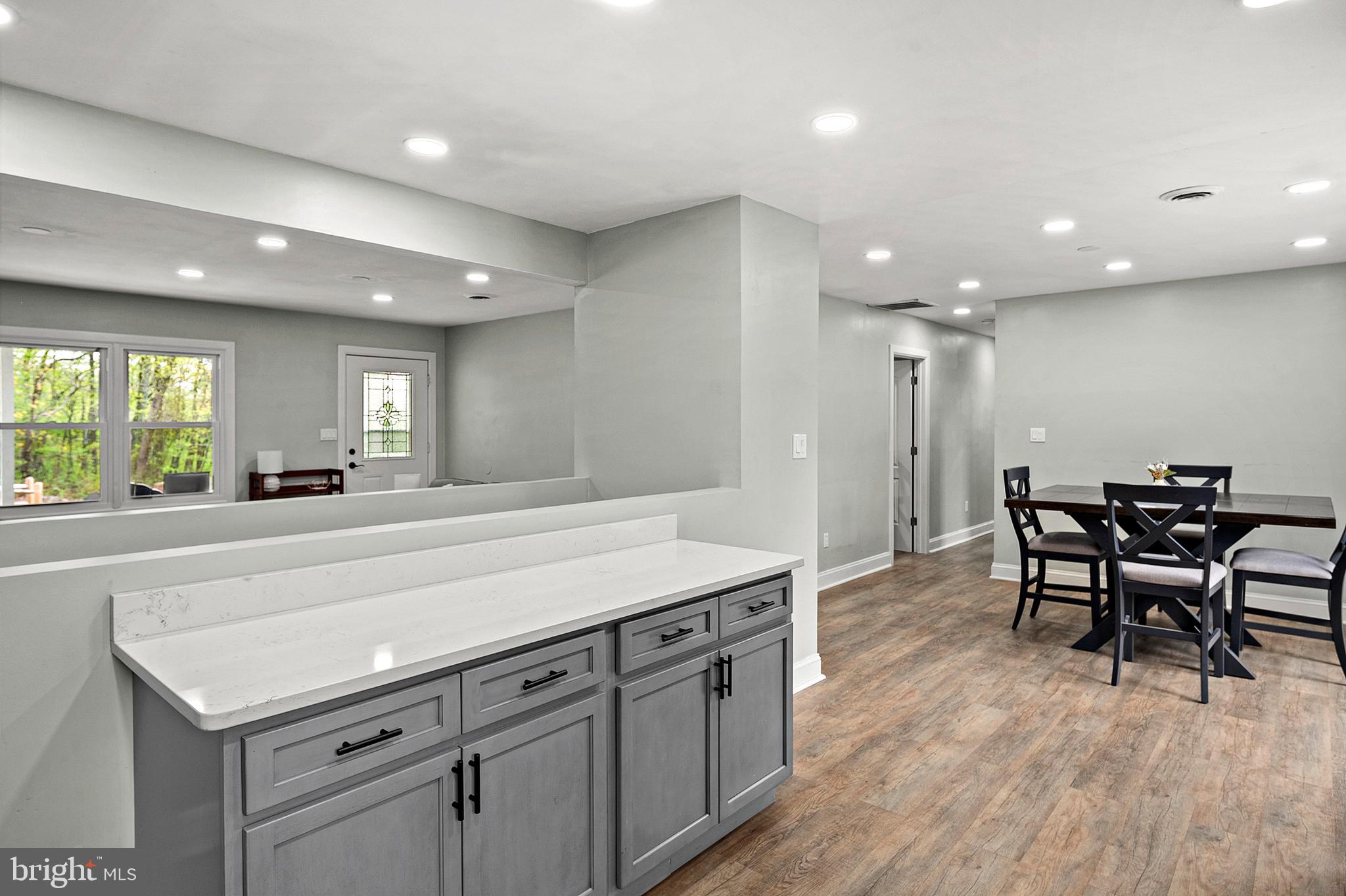 11439 Mountain View Road Damascus, MD 20872 - Photo 11 of 46 High-end Quartz countertops and breakfast bar