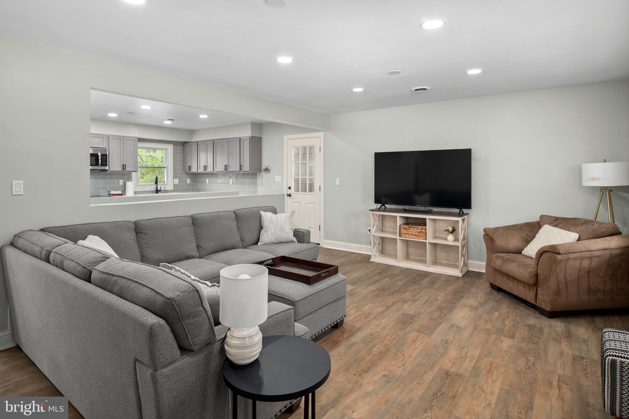 11439 Mountain View Road Damascus, MD 20872 - Photo 7 of 46 The main level living room is bright and inviting