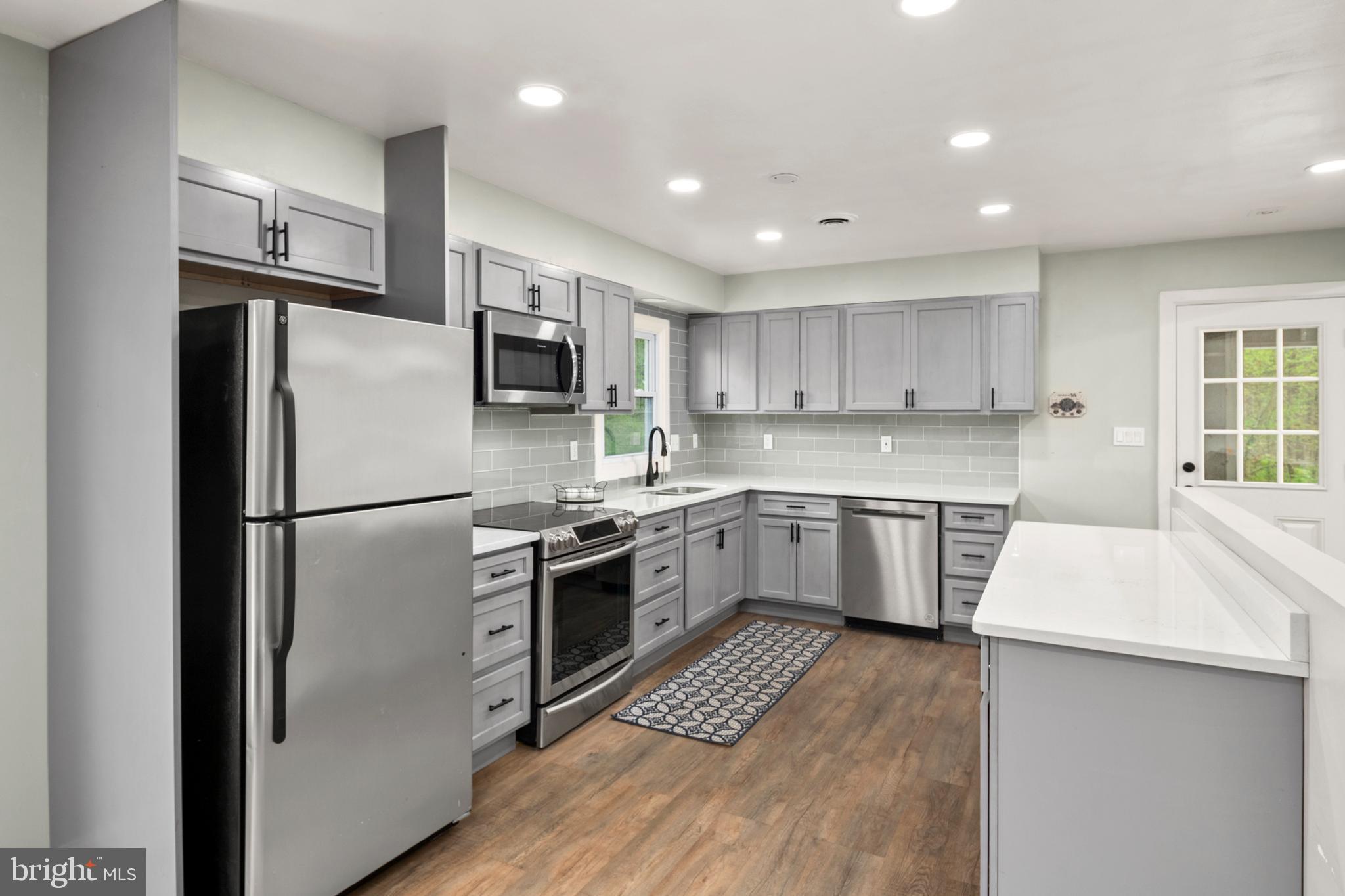 11439 Mountain View Road Damascus, MD 20872 - Photo 9 of 46 The completely renovated kitchen!