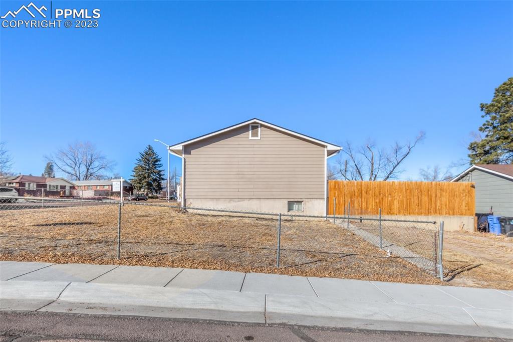 125 Chelton Road Colorado Springs, CO 80909 - Photo 25 of 26 a view of a terrace