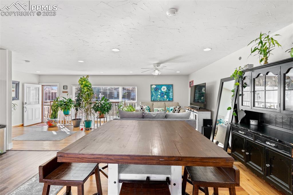 125 Chelton Road Colorado Springs, CO 80909 - Photo 6 of 26 a view of a dining room with furniture