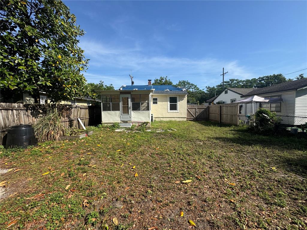 636 Columbia Street Orlando, FL 32805 - Photo 14 of 14 a front view of a house with a yard