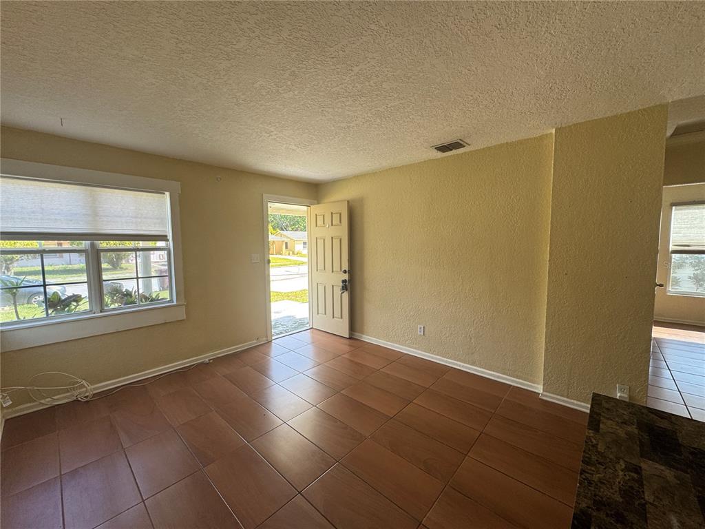636 Columbia Street Orlando, FL 32805 - Photo 3 of 14 a view of an empty room with a window