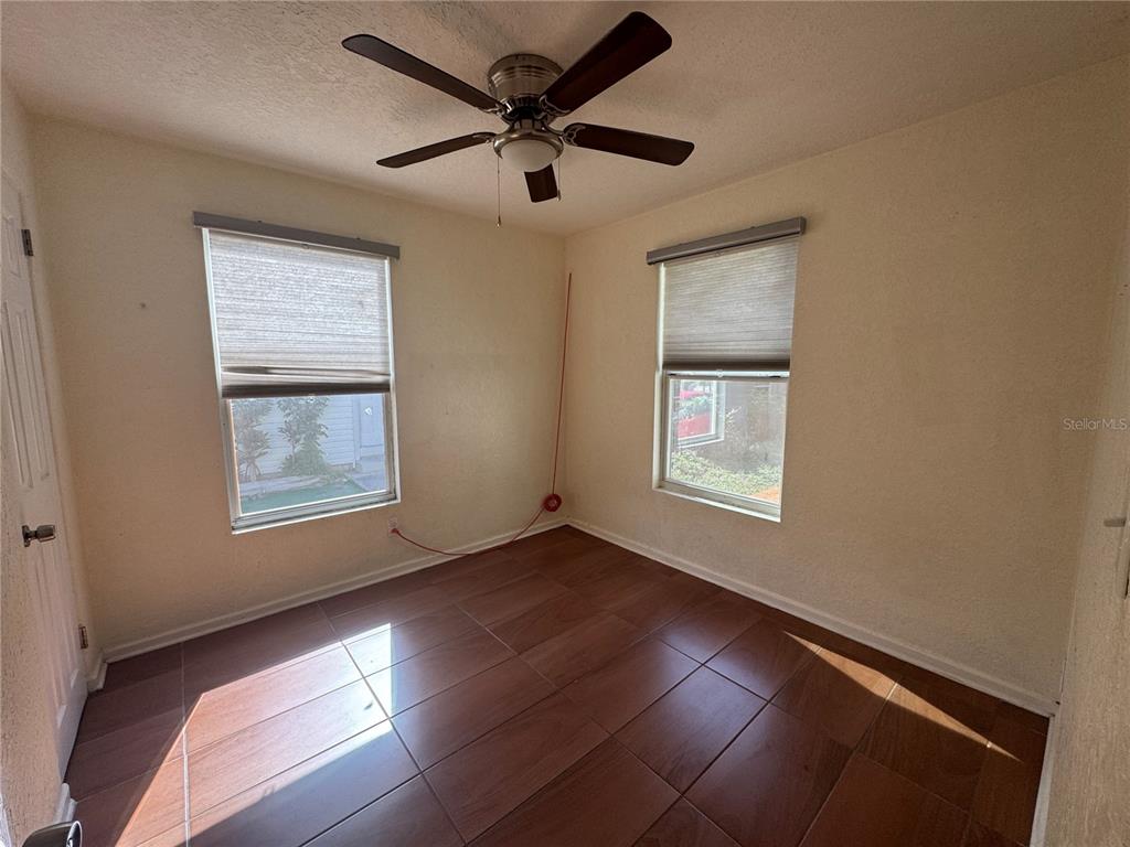 636 Columbia Street Orlando, FL 32805 - Photo 8 of 14 a view of an empty room and window