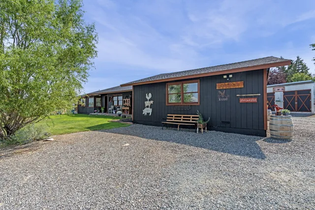 a house view with a backyard space