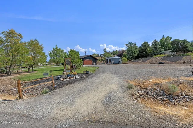 a view of a road with a yard