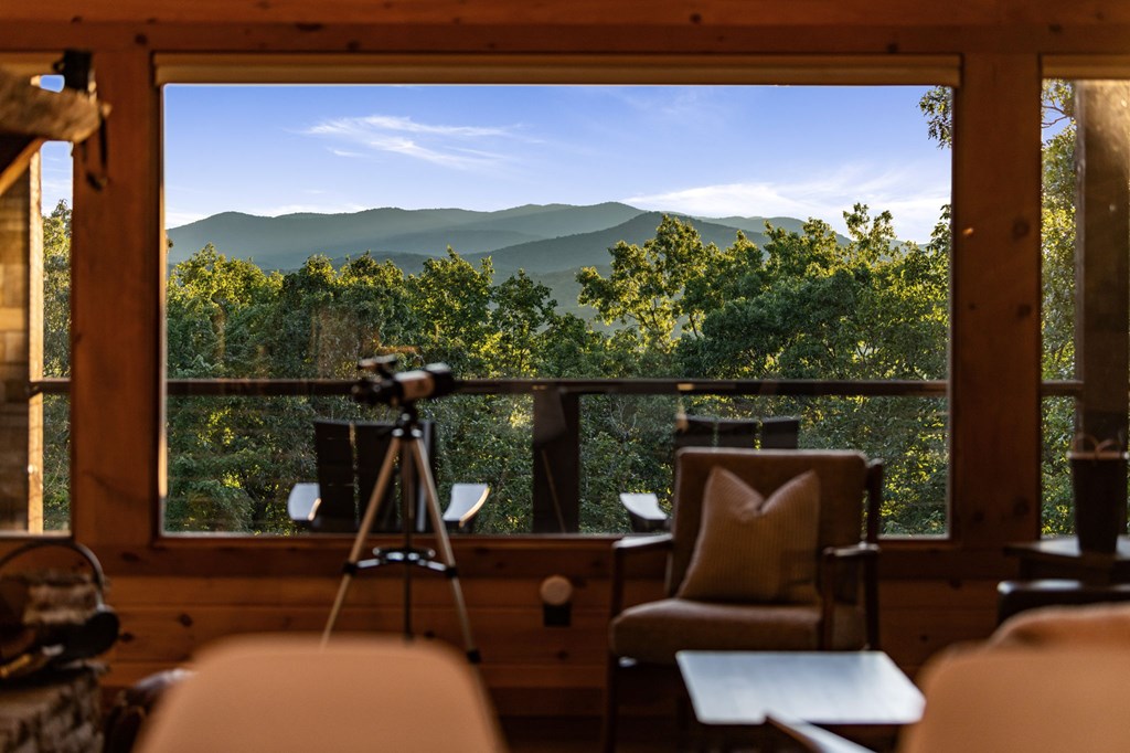 361 June Bug Lane Blue Ridge, GA 30513 - Photo 3 of 65 a view of a chairs in balcony