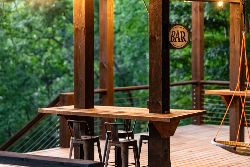 361 June Bug Lane Blue Ridge, GA 30513 - Photo 46 of 65 a view of balcony with wooden floor and outdoor seating