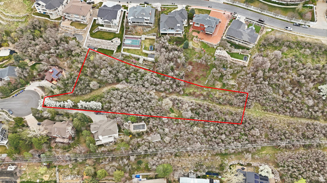 331 South 1550th Street East, Unit 3 Bountiful, UT 84010 - Photo 4 of 30 Aerial view of residential area with property boundaries highlighted