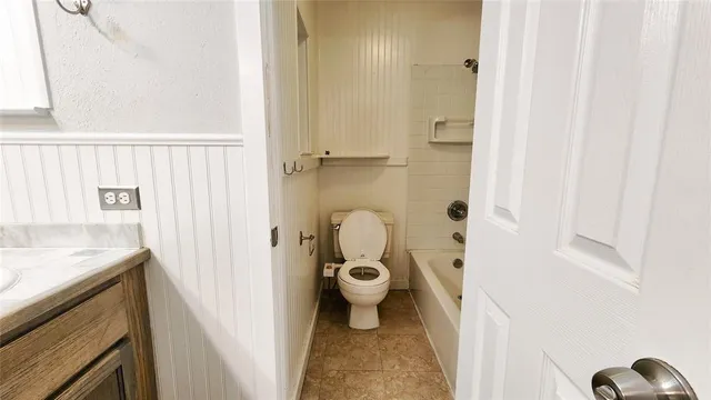 a bathroom with a sink and a toilet